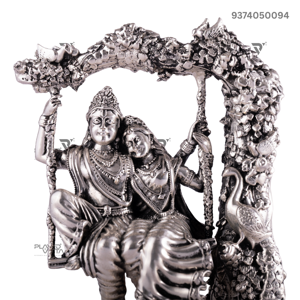 Silver Idol depicting Radha and Krishna