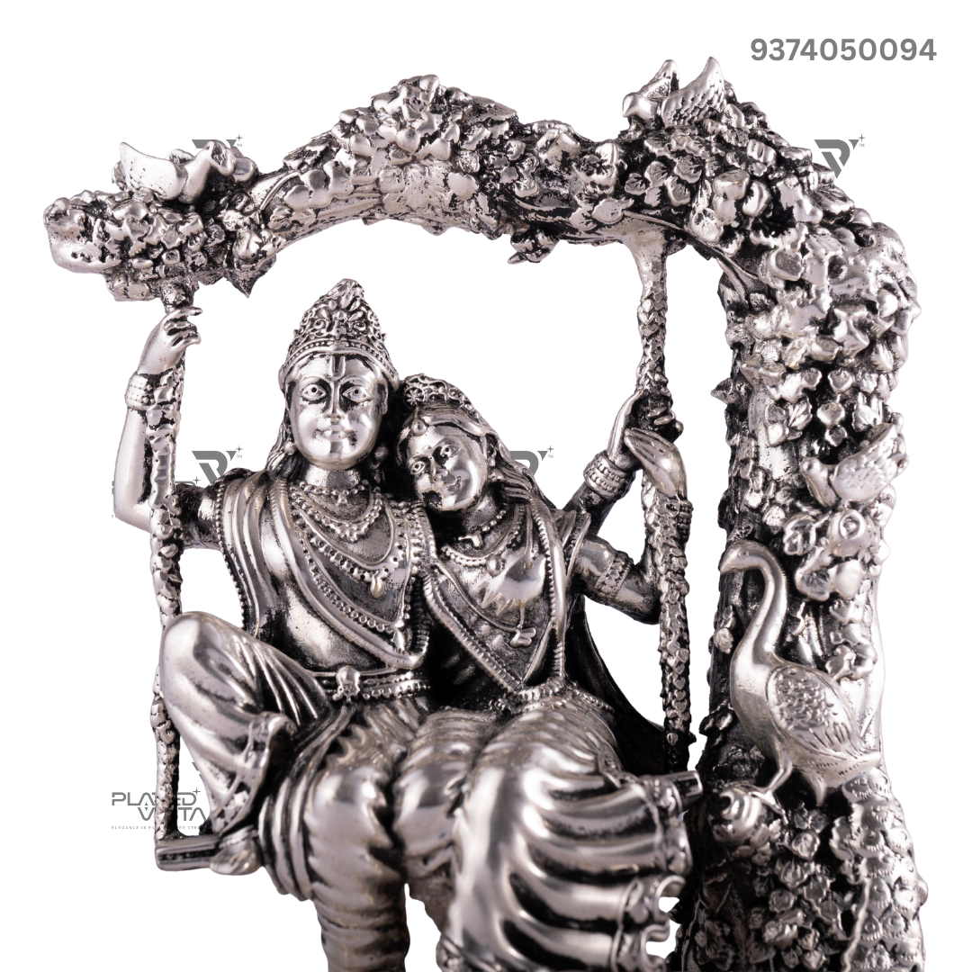 Silver Idol depicting Radha and Krishna