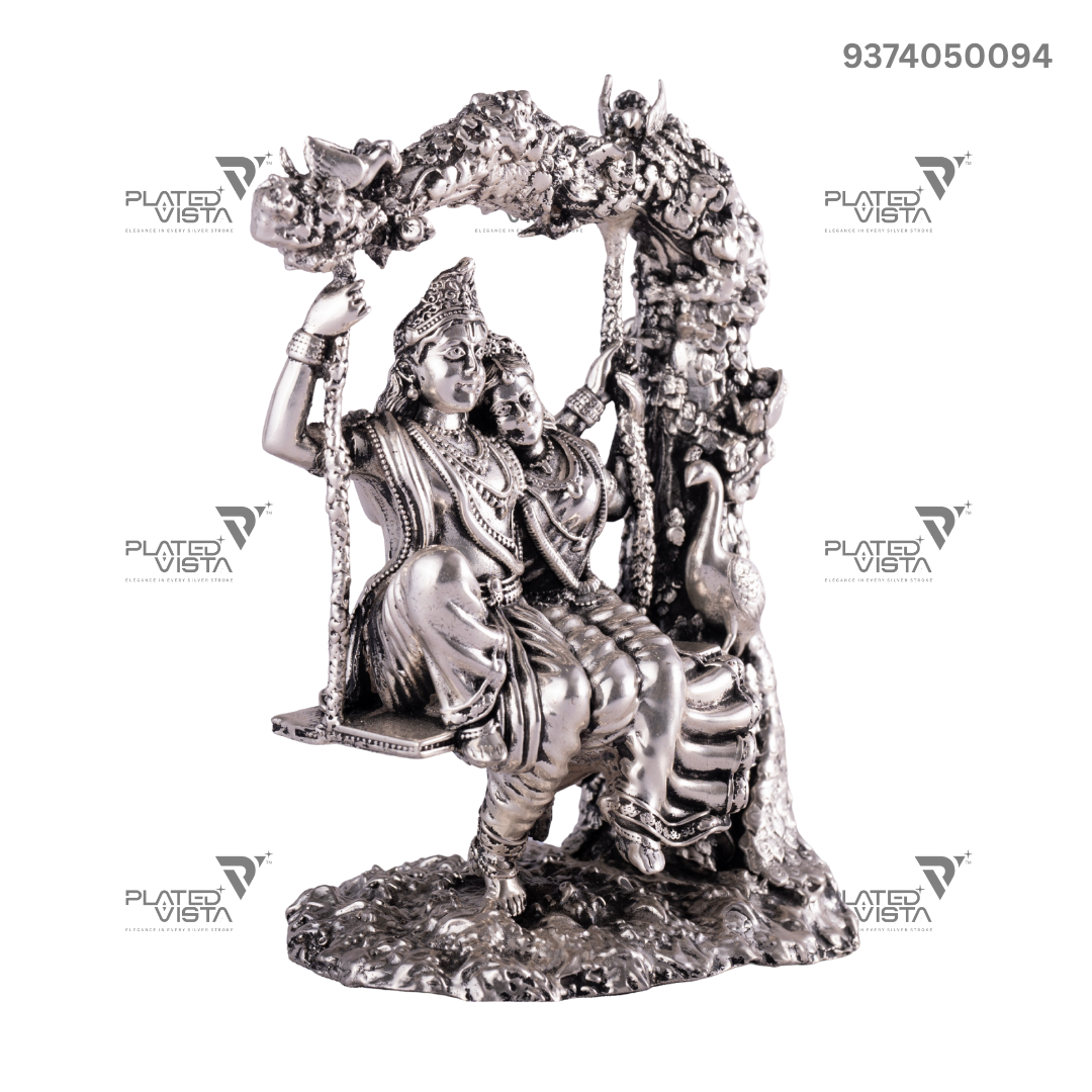 Silver Idol depicting Radha and Krishna