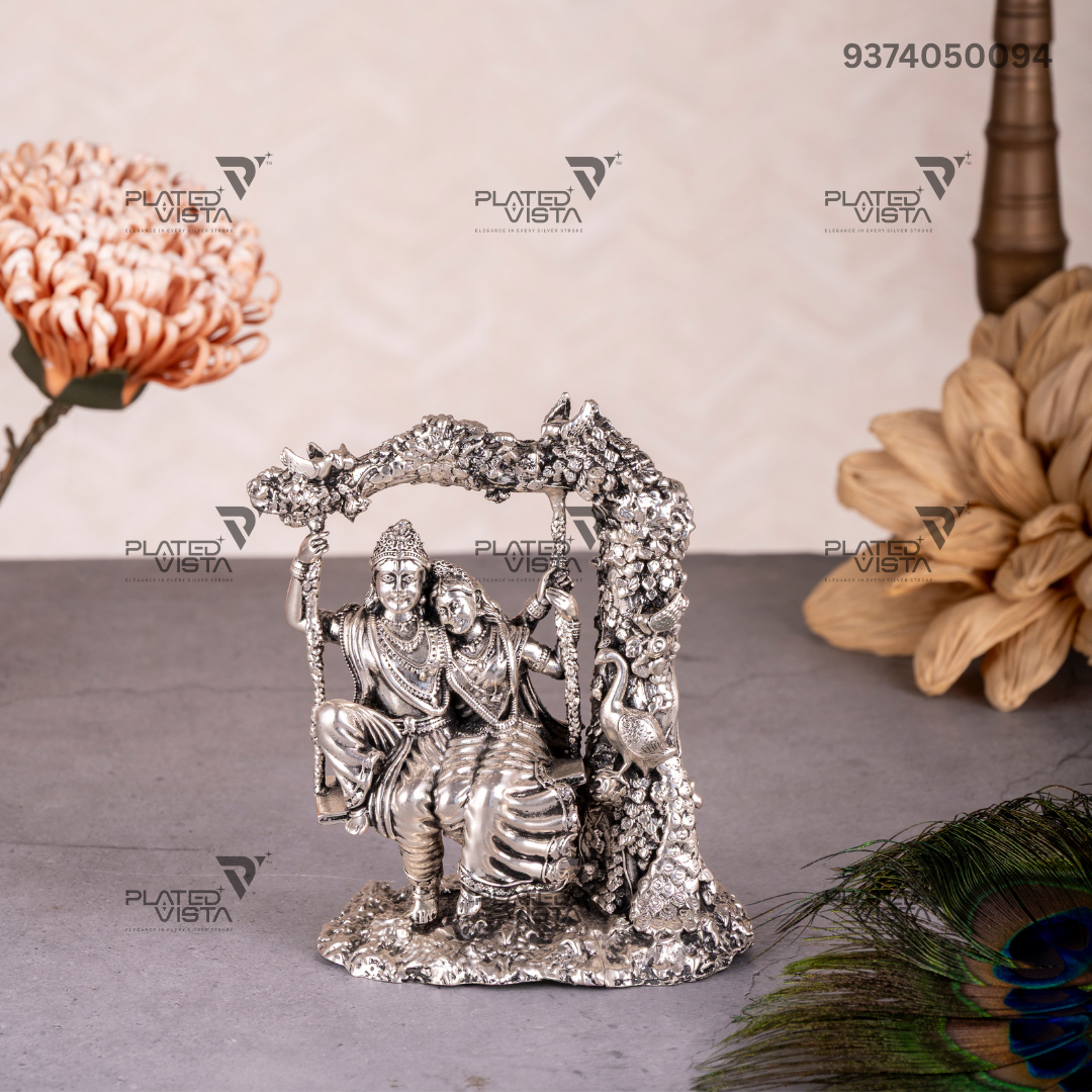 Silver Idol depicting Radha and Krishna